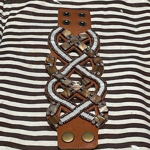 Tommy Bahama beaded and rhinestone brown leather bracelet with adjustable snaps.